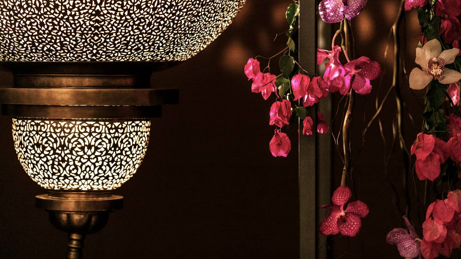 Close-up of Moroccan lantern, pink flowers in Atlantique Ballroom