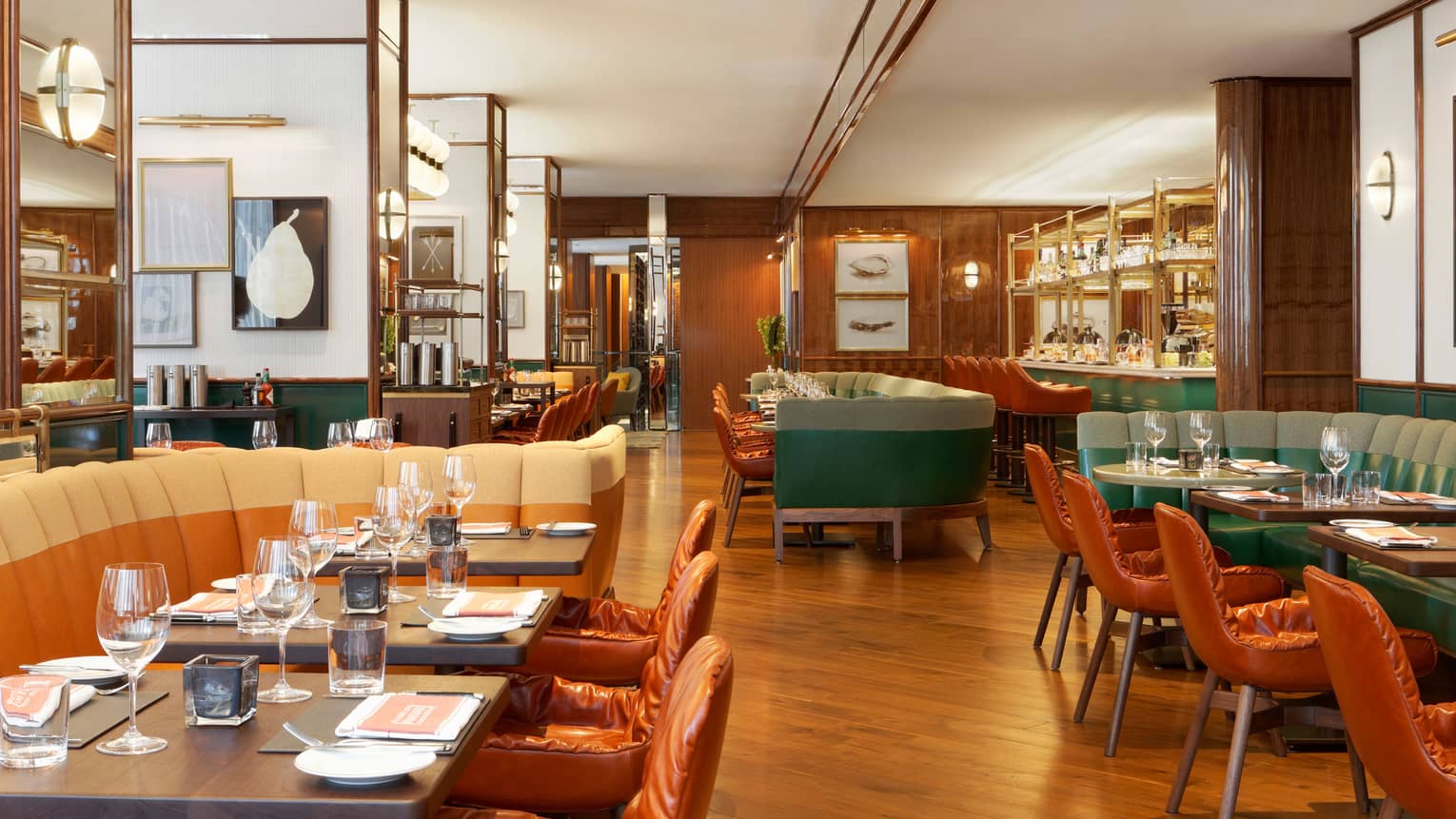 Cafe Boulud dining room with leather chairs, banquettes, sunny dining room