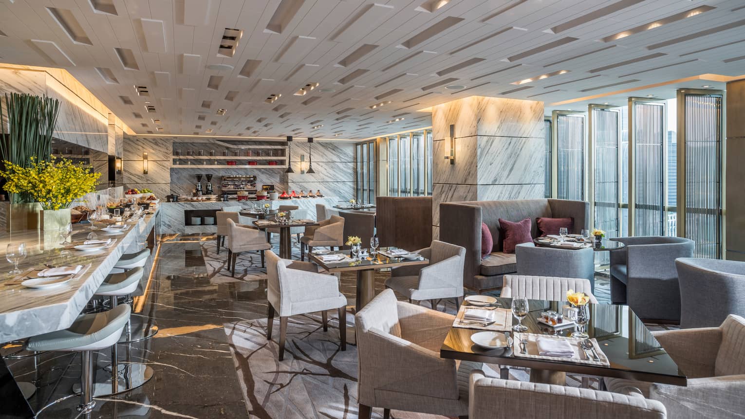 Executive Club Lounge modern dining room with decorative white ceilings, marble bar 