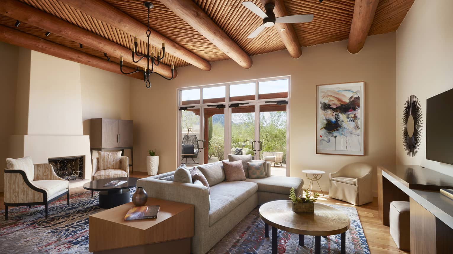 Prescott Suite seating areas under beam ceiling with small fan