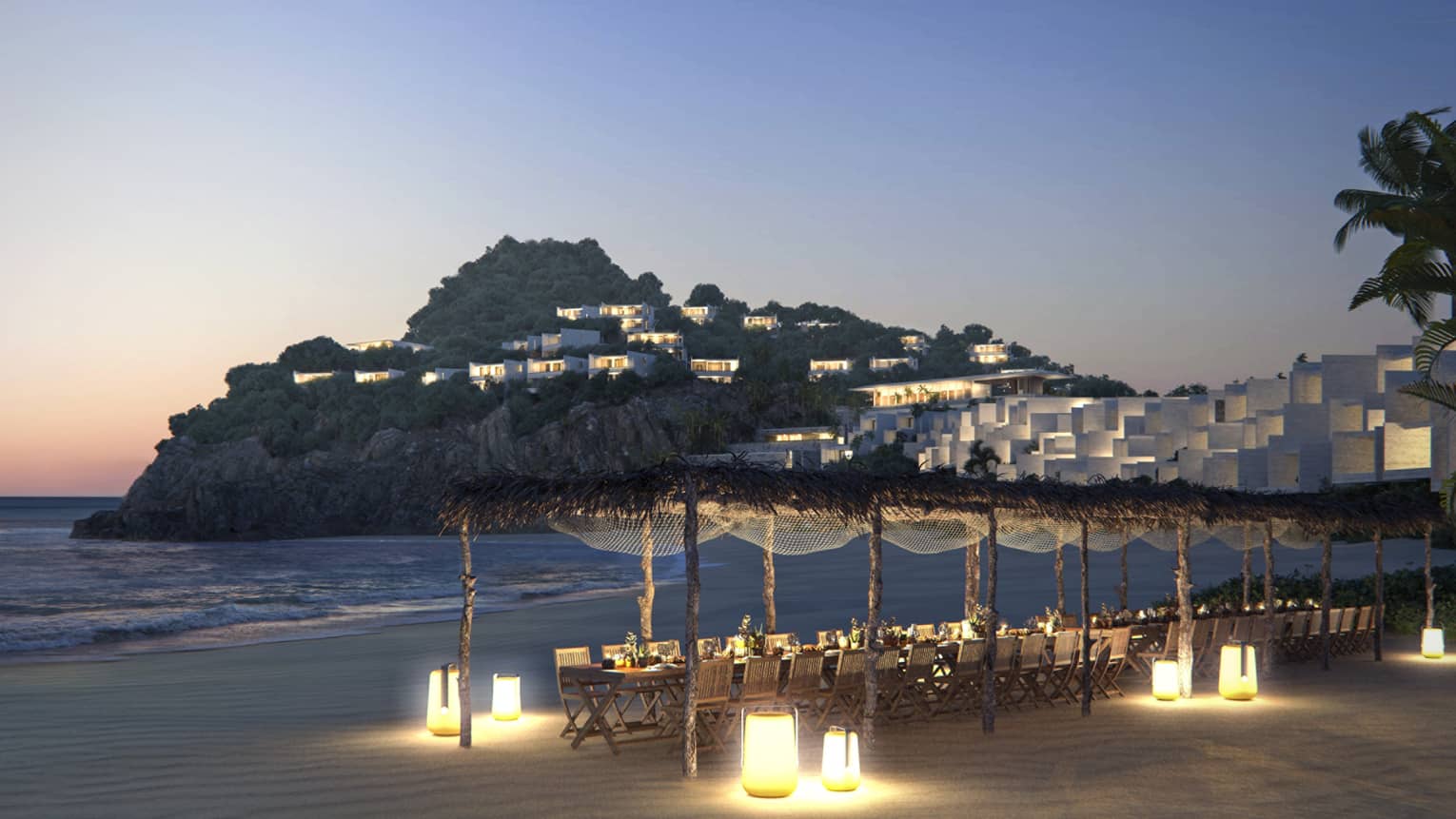 Long table set for private event on the beach