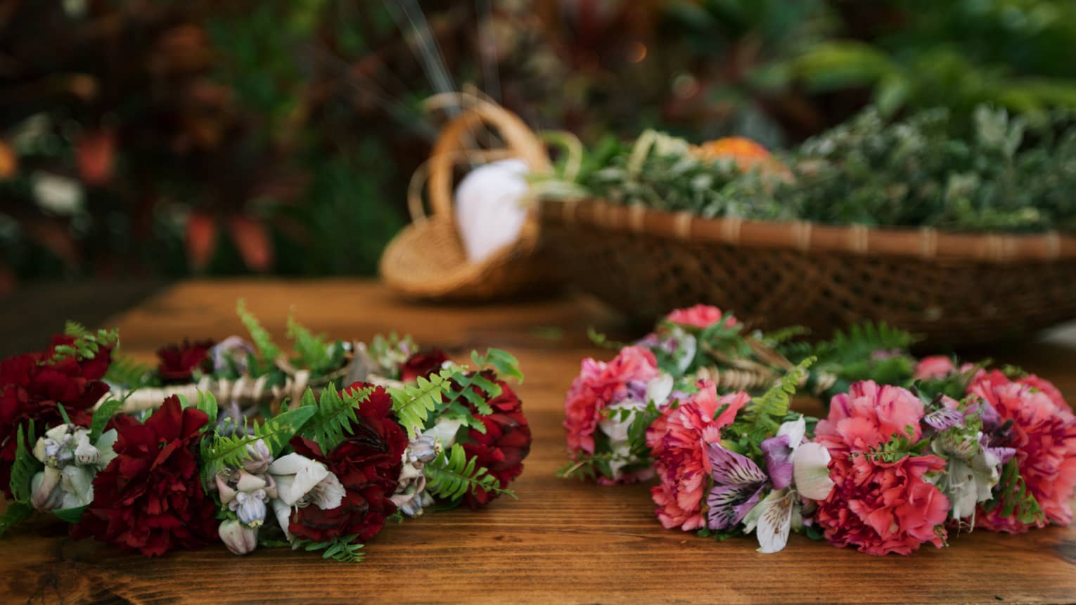 Floral wedding crowns on table near basket