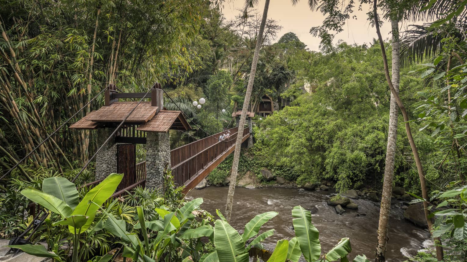 Sayan Bridge in Bali is surrounded by lush vegetation