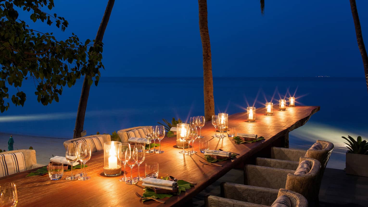 Outdoor dining venue with a view of the Gulf of Thailand
