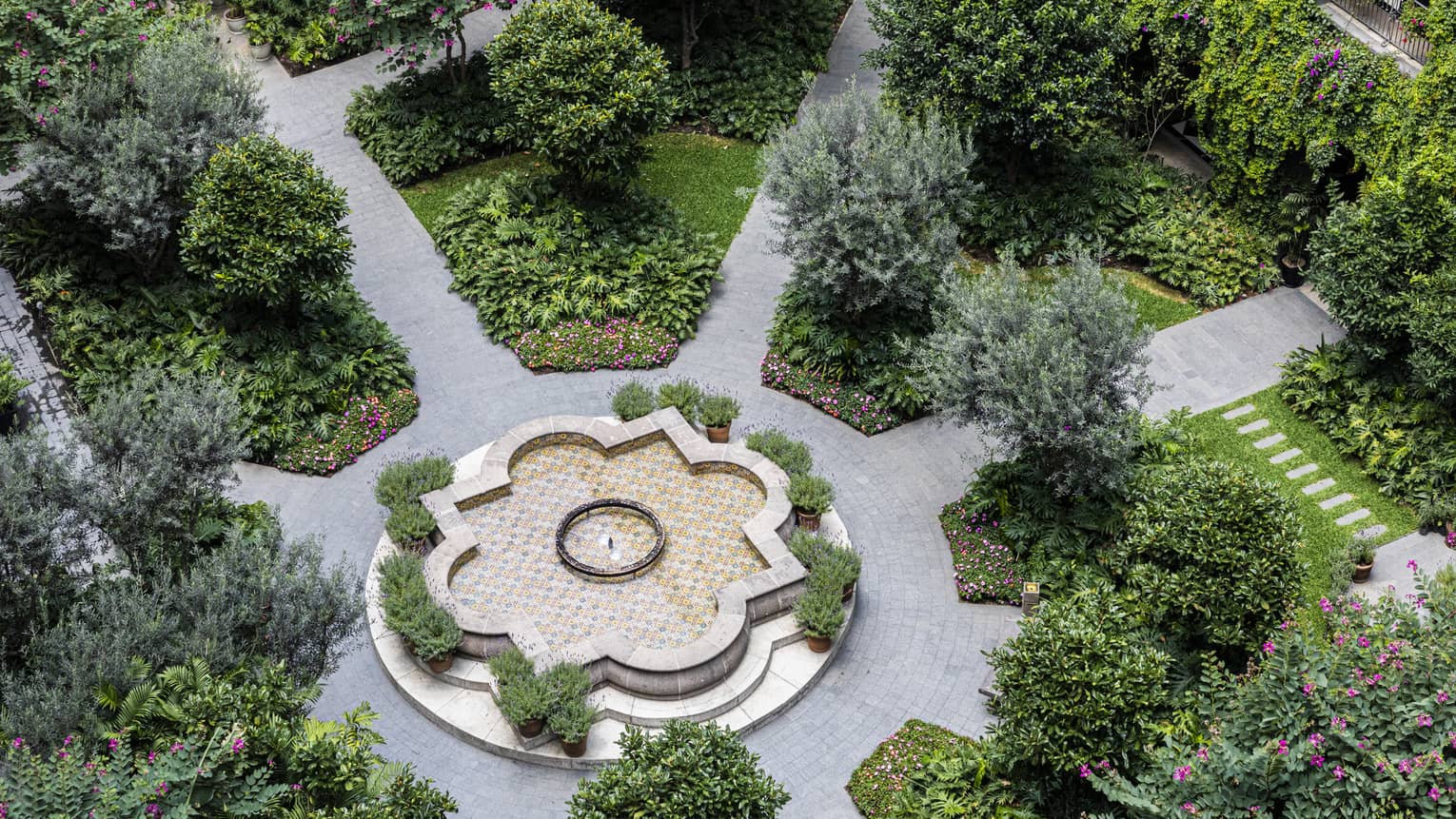 Aerial view of a courtyard filled with greenery