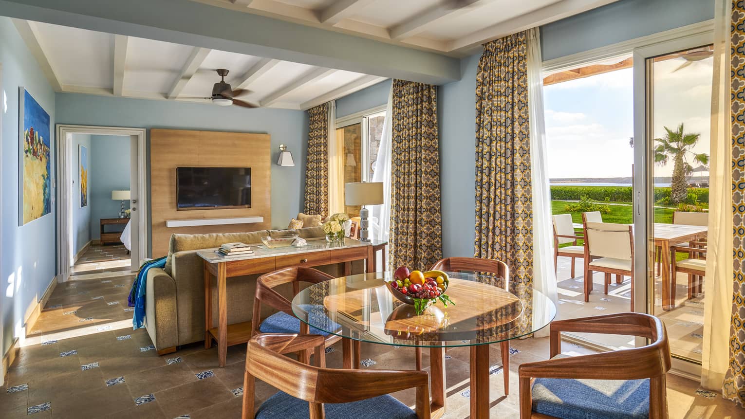 A brightly-colored beach suite overlooking the marsh at four seasons hotel alexandria 