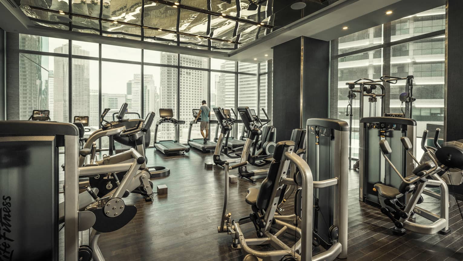 Fitness centre that looks out on the city skyline