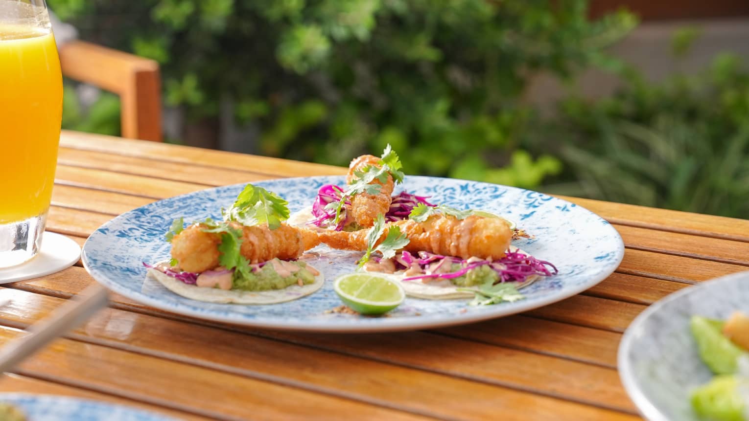 Prawn tacos on a plate.