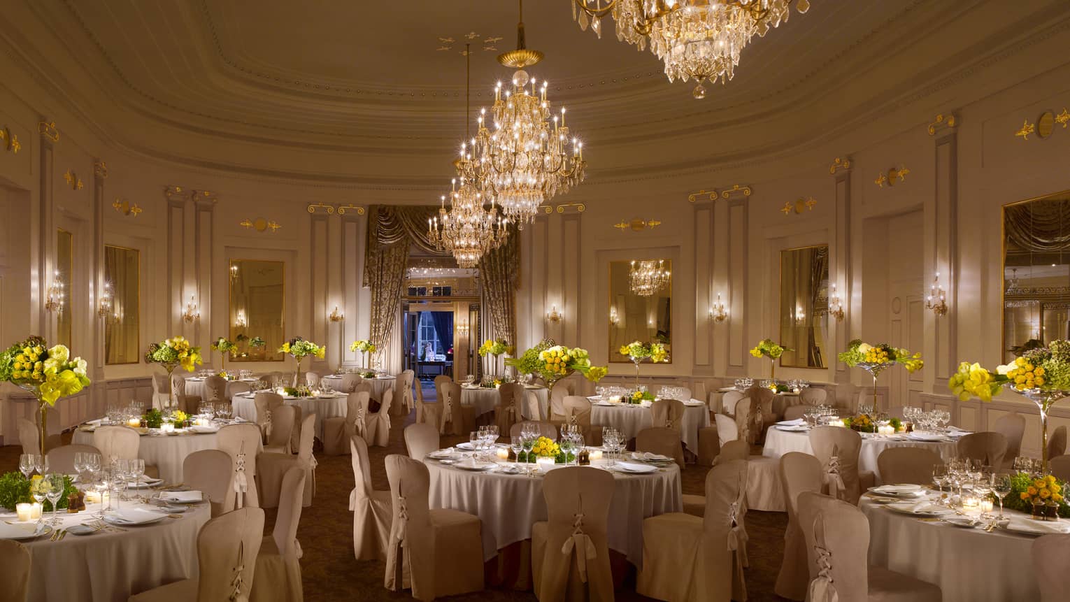 Salle des Nations elegant banquet set up under large crystal chandeliers 