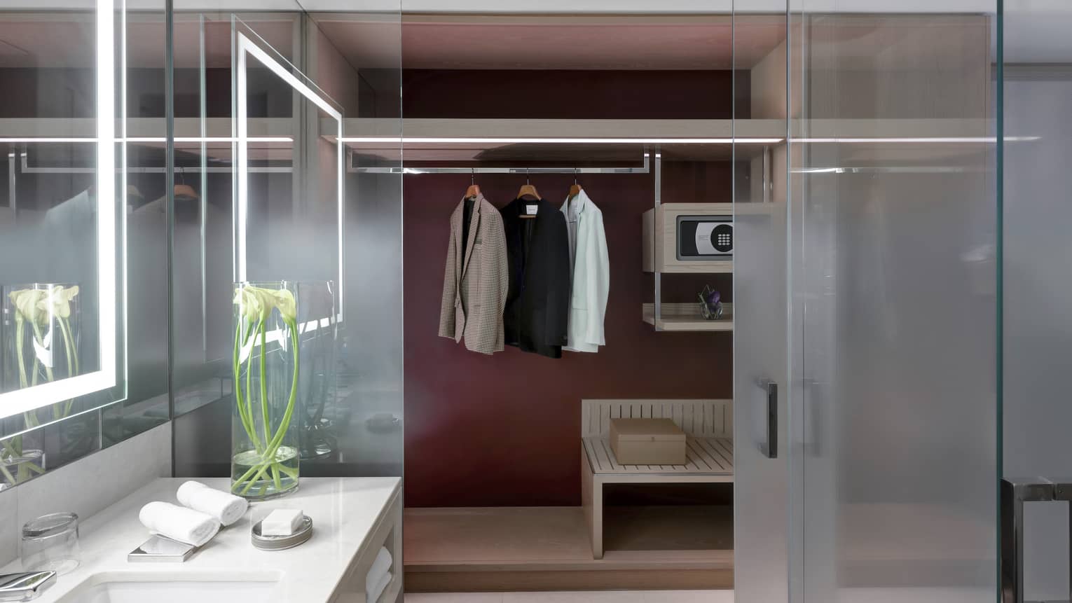 Bathroom opening to a closet
