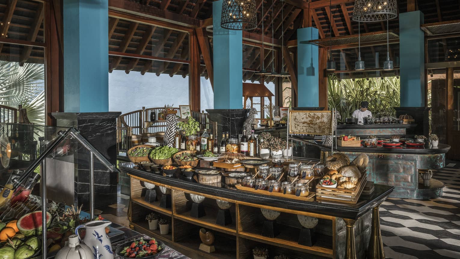 Lower Serai Restaurant Buffet with a chef cooking and fresh fruit