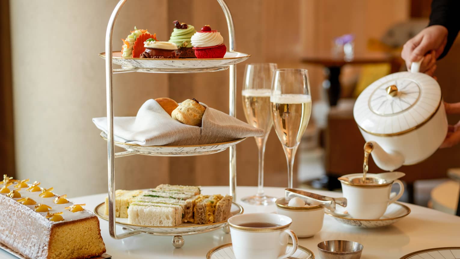 Afternoon tea with pastries and champagne in Rotunda Lounge