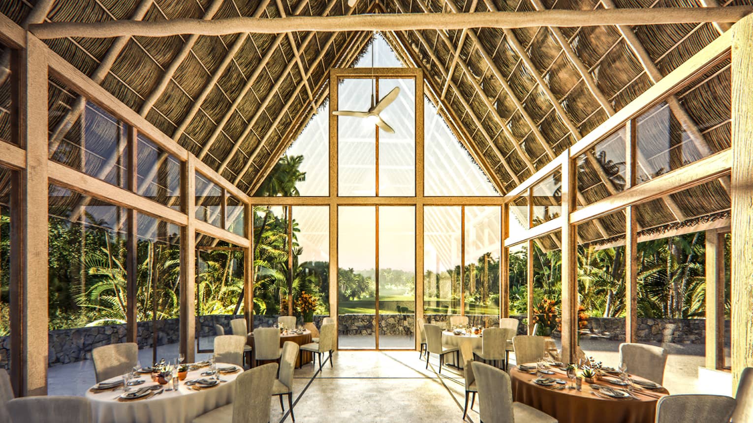Pitched thatched-roof event room with walls of windows