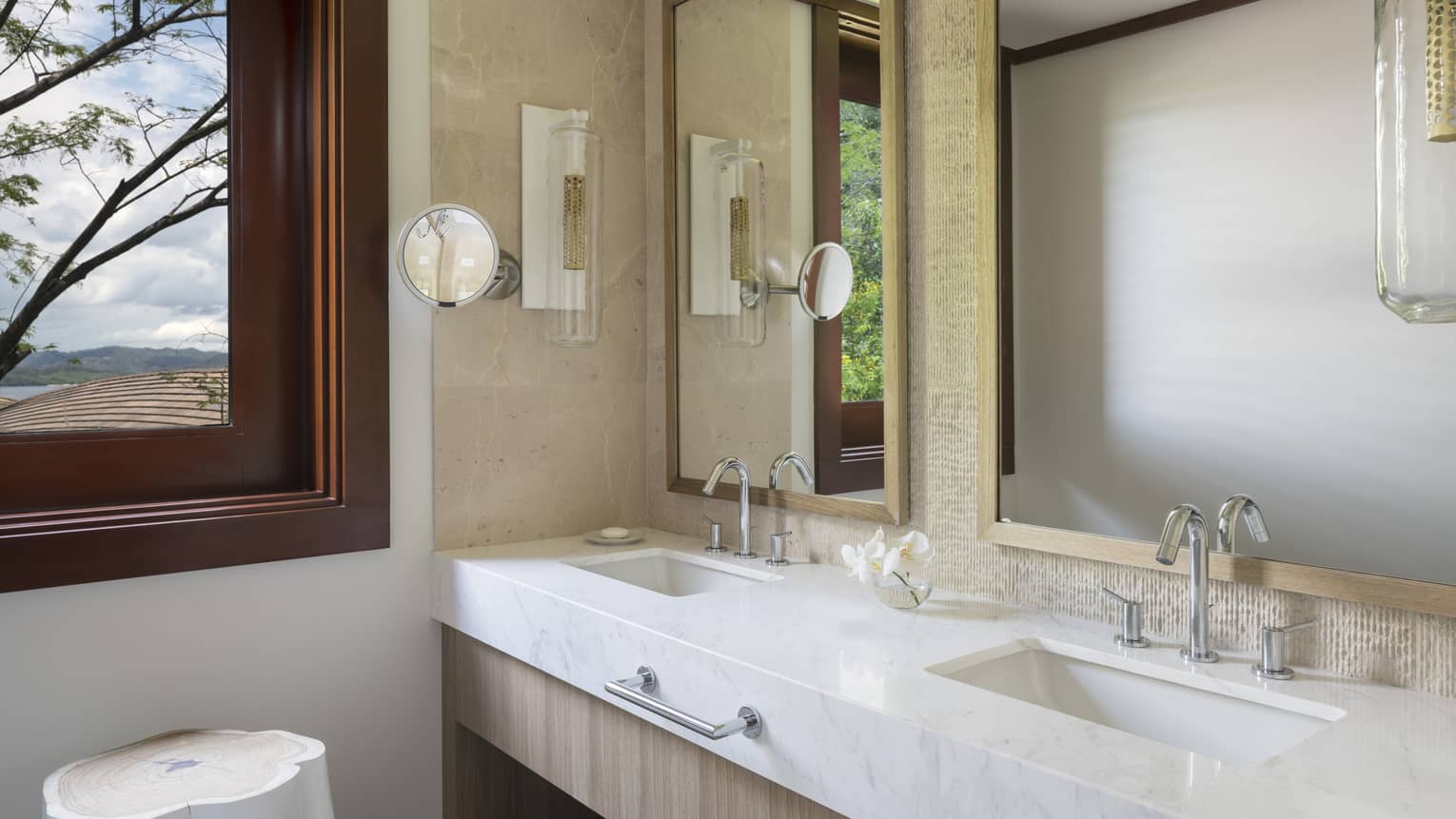Bathroom View of Sinks and Mirrors with Window 