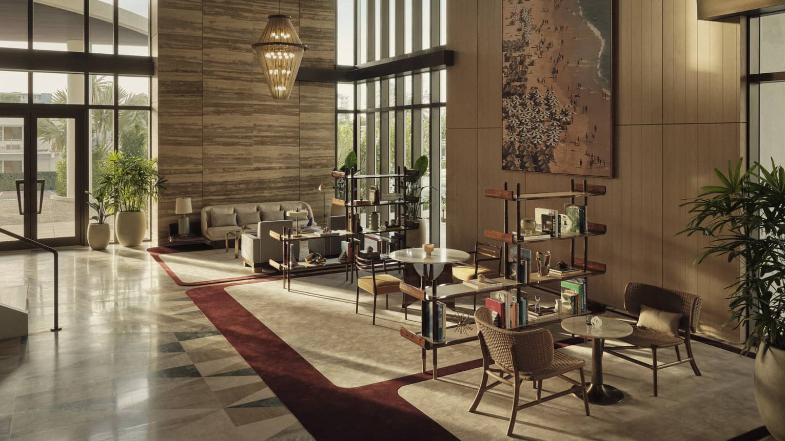 The lobby area of a hotel with chairs, sofas, small tables, shelves, and large wall art.