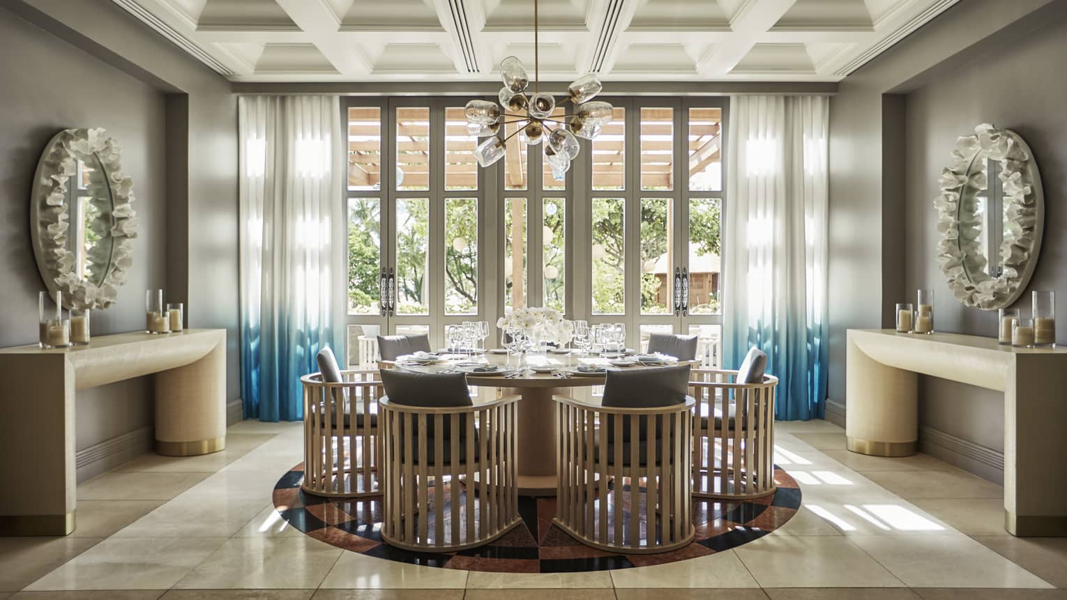 Modern wood chairs around table, glass lantern chandelier in Noe private dining room