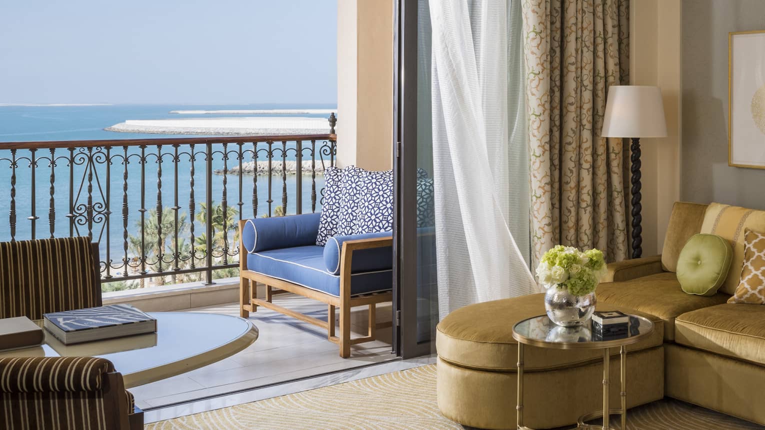 luxury hotel room with elegant decor and sea view