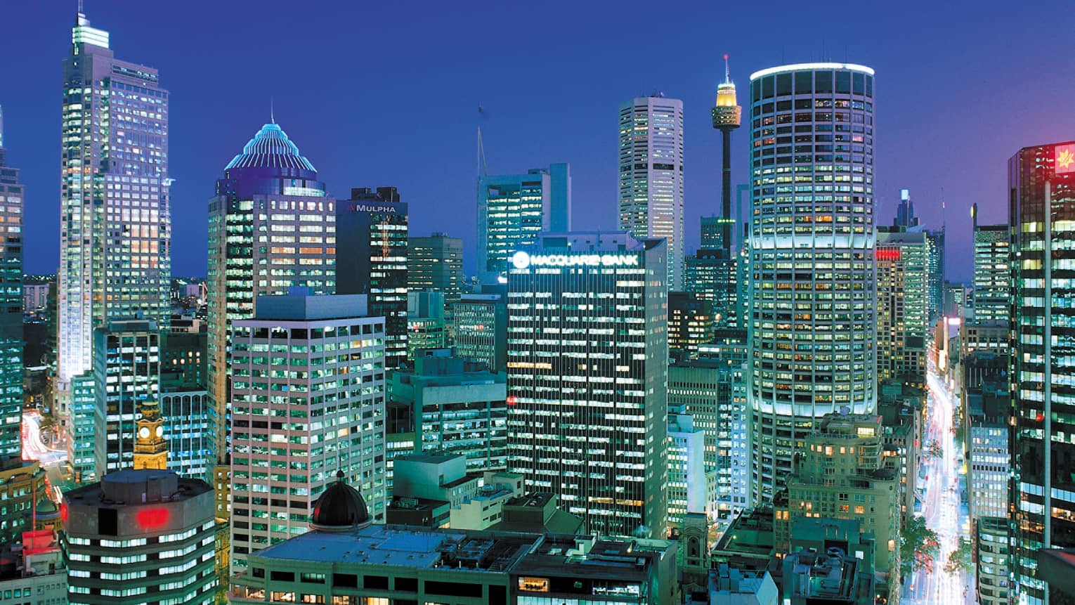 Skyscrapers, lights at night in Sydney's Central Business District