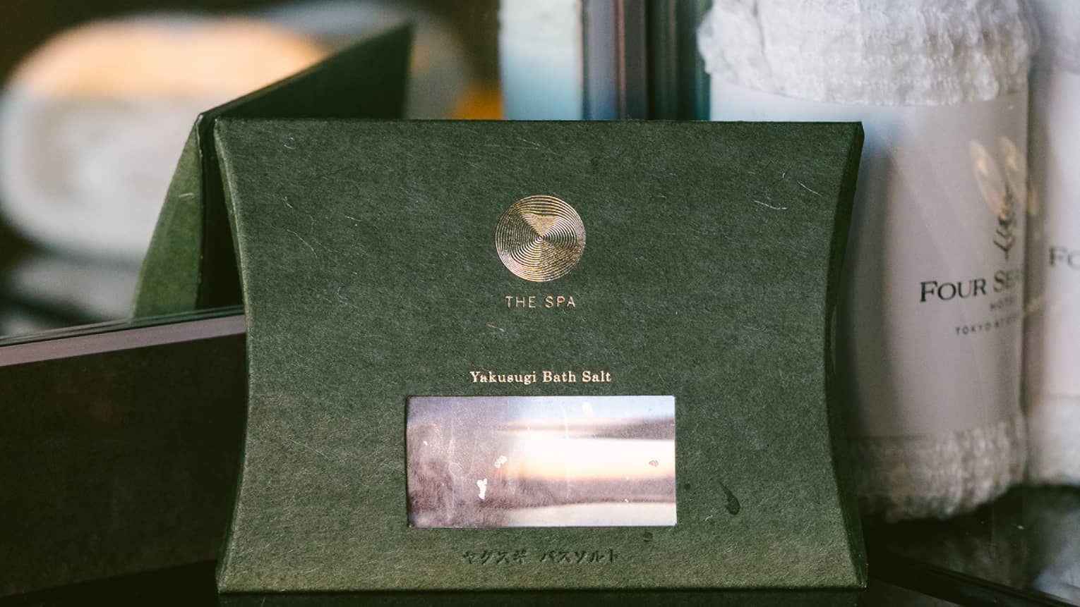 Yakusugi bath salts in green box with silver foil seal