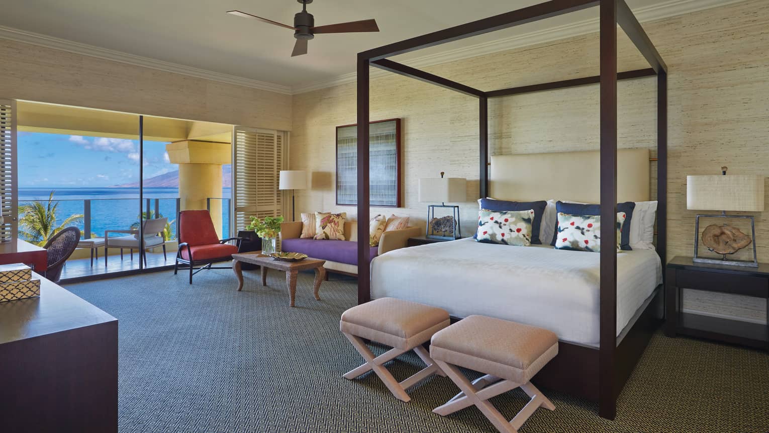 Maile Suite master bedroom with four poster bed and doors leading out to private terrace
