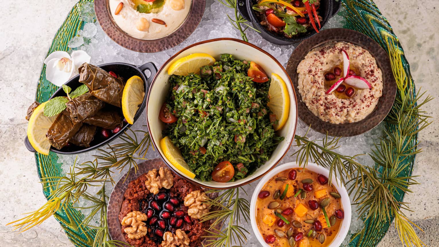 An assortment of food in small bowls.