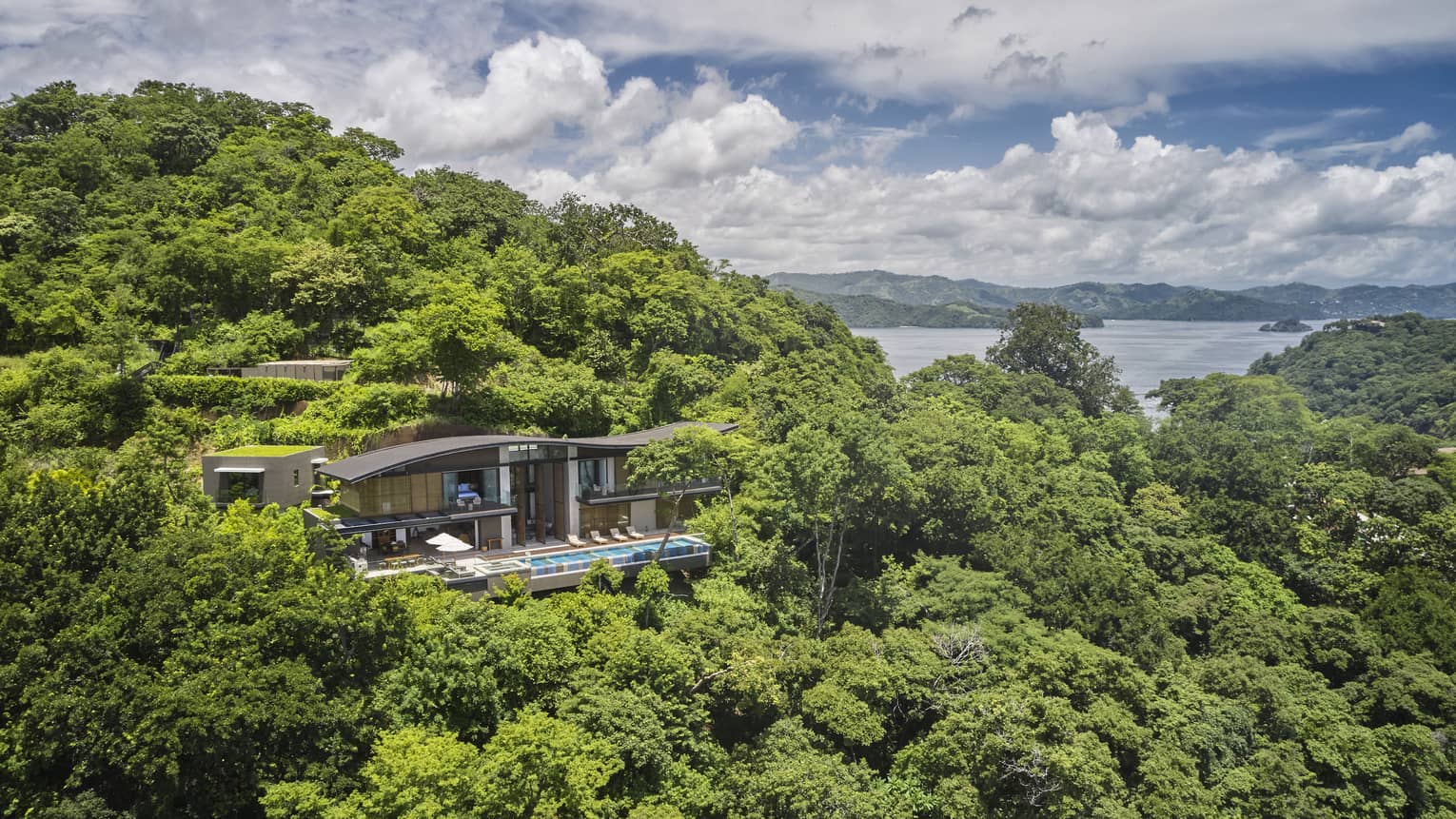 Outdoor terrace of a private villa nestled in the trees in Costa Rica