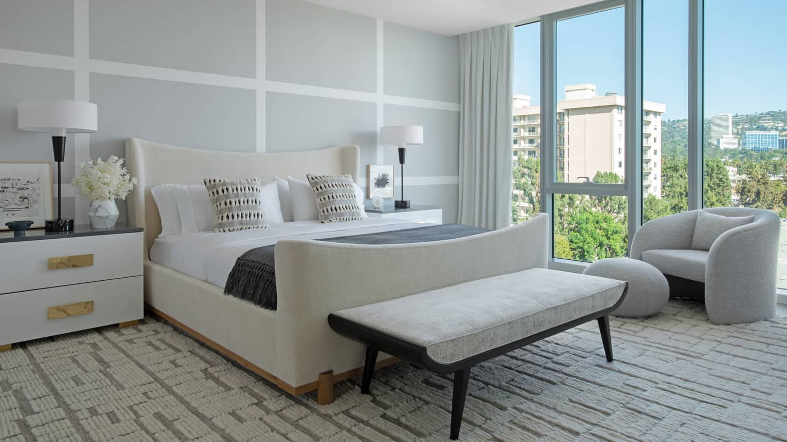 View of bedroom and floor-to-ceiling windows