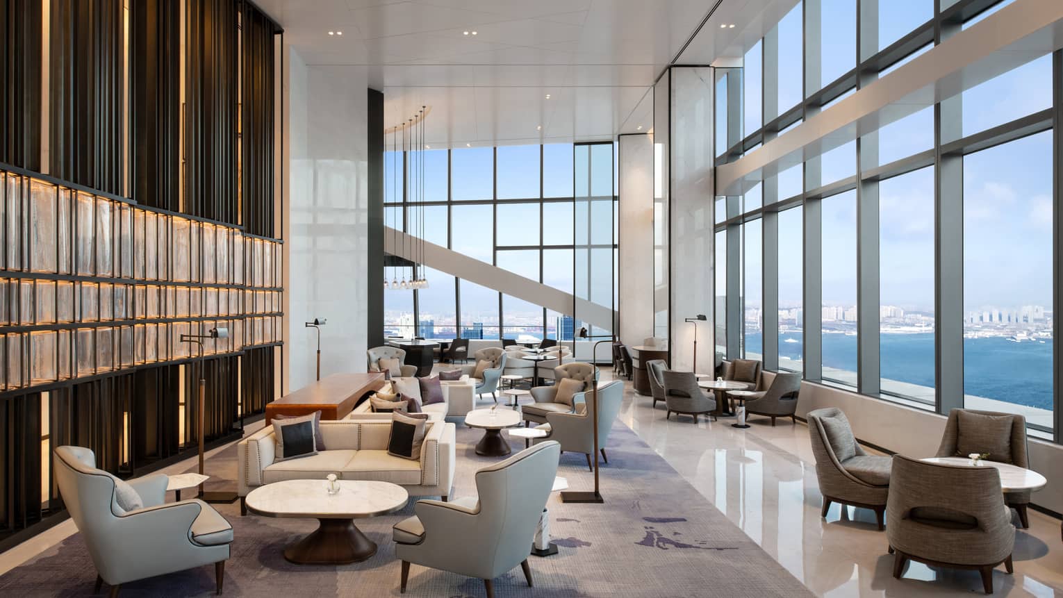 Hotel lounge with water view at Four Seasons Hotel Dalian