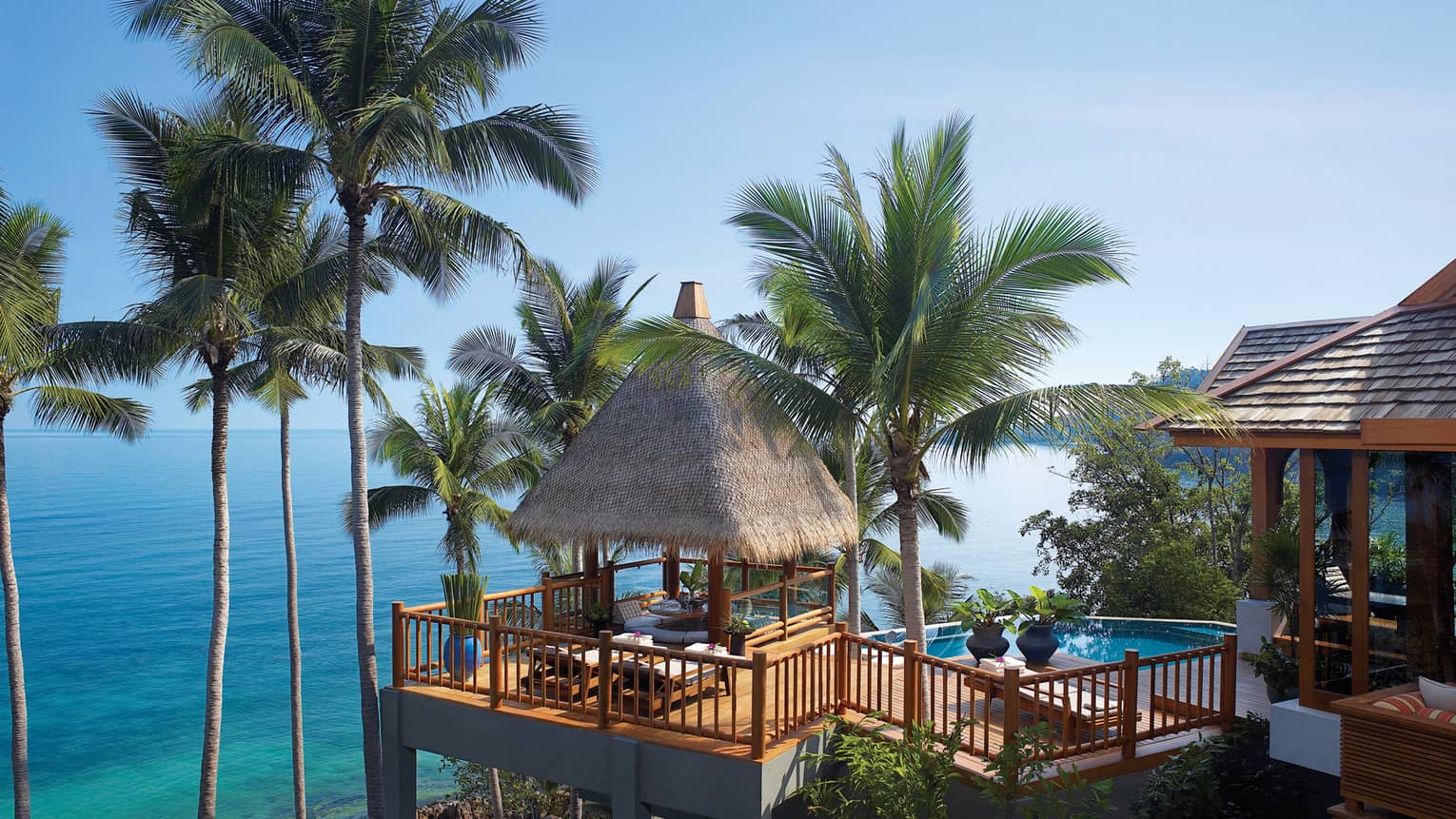 Two-Bedroom Residence Villa with Pool patio with thatched roof cabana on mountain high above trees, ocean