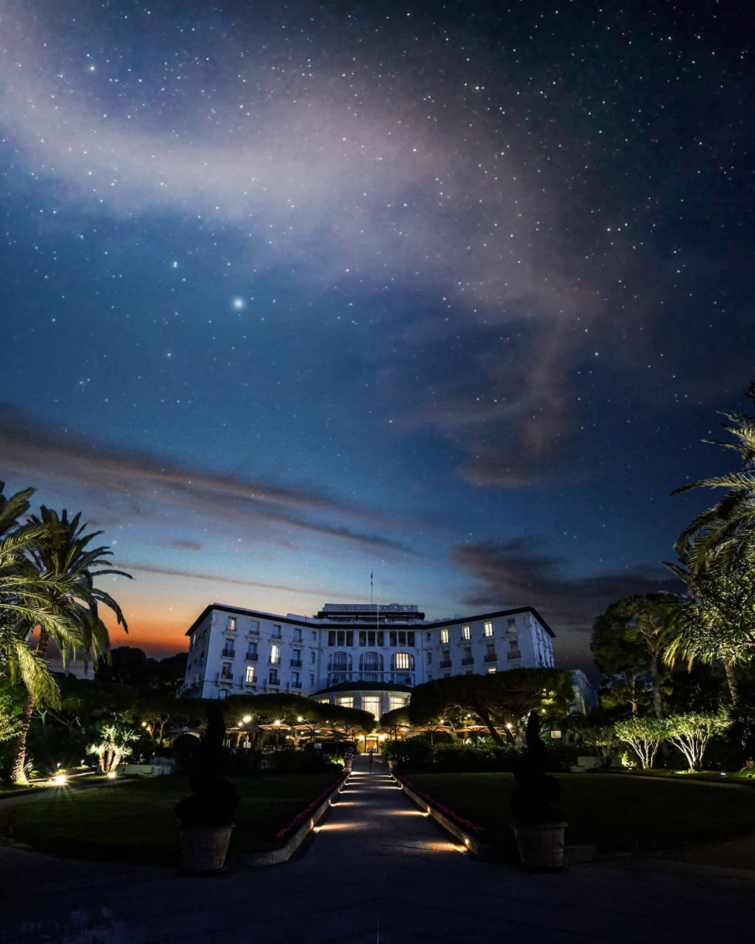Starry sky, palm trees above Four Seasons Grand-Hotel du Cap-Ferrat