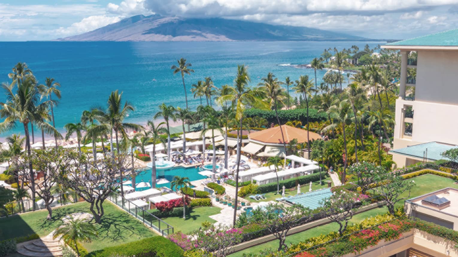 View from a balcony at Maui resort, with view of ocean and resort grounds
