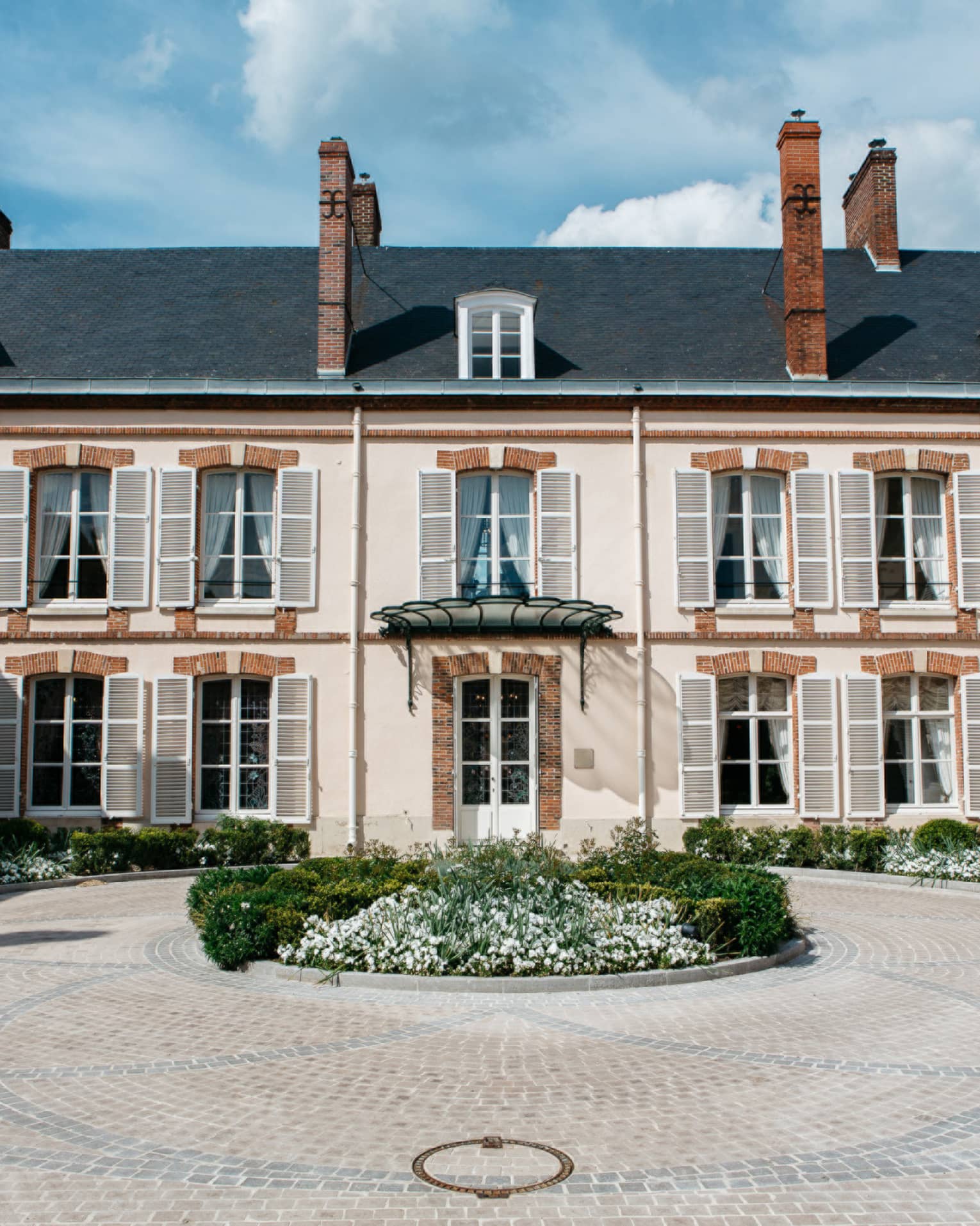 Rear courtyard view of the Maison Belle �poque 19th-century mansion