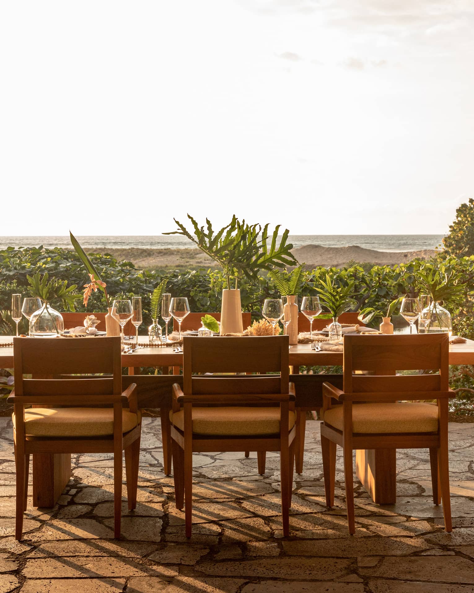 Outdoor dining table for six set near Hawaiian beach