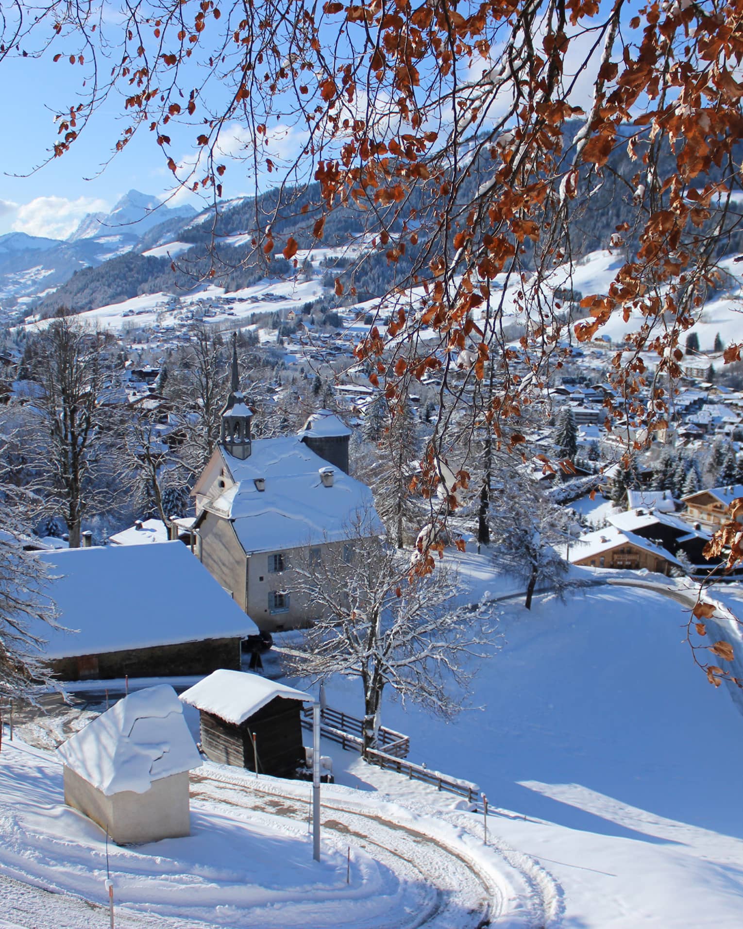 The snow-covered Megève Calvary just above the Mègeve village