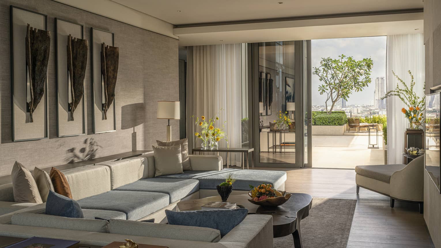 Living room in two-bedroom suite at Four Seasons Hotel Bangkok