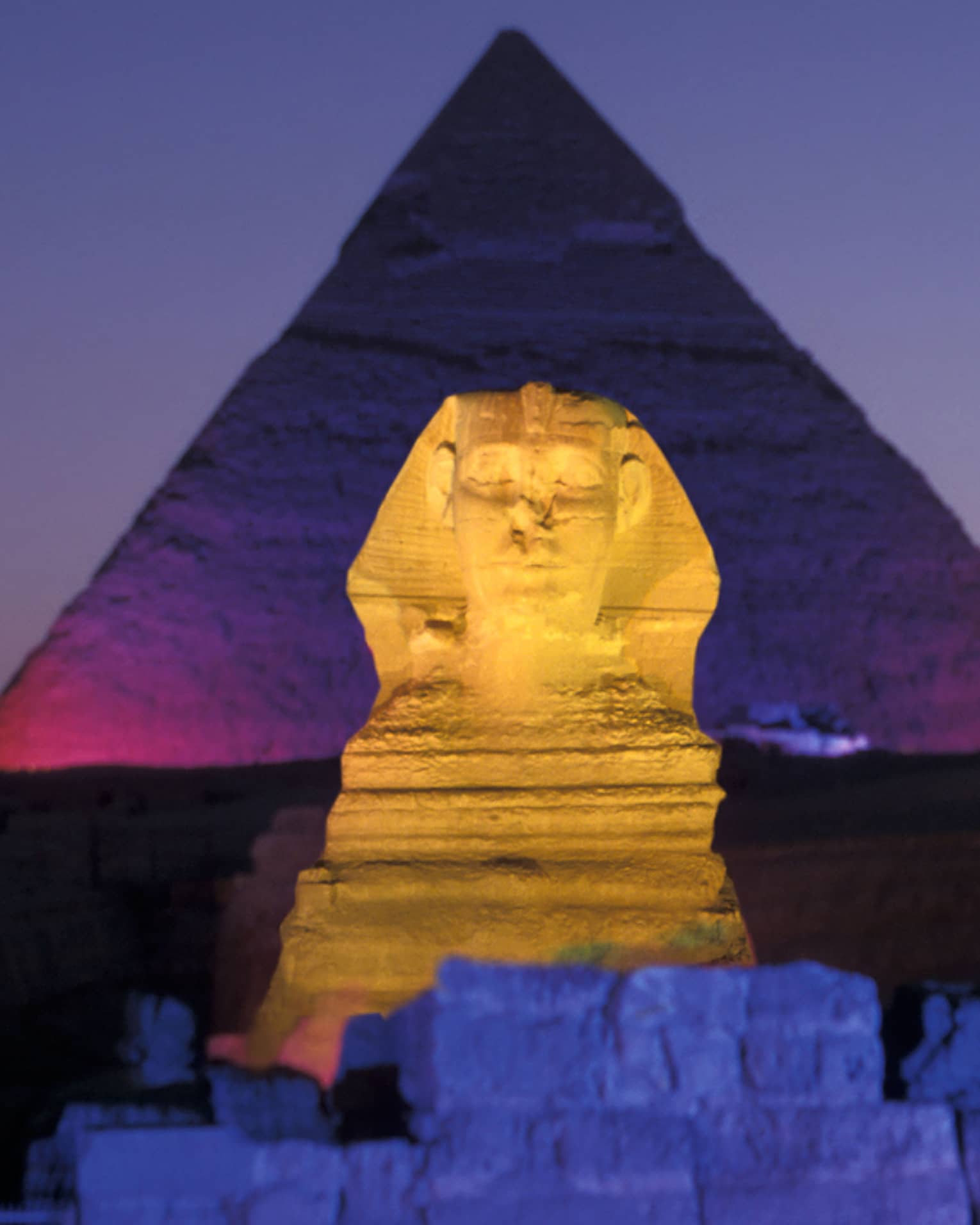 Night view of Pyramids of Giza and Great Sphinx illuminated