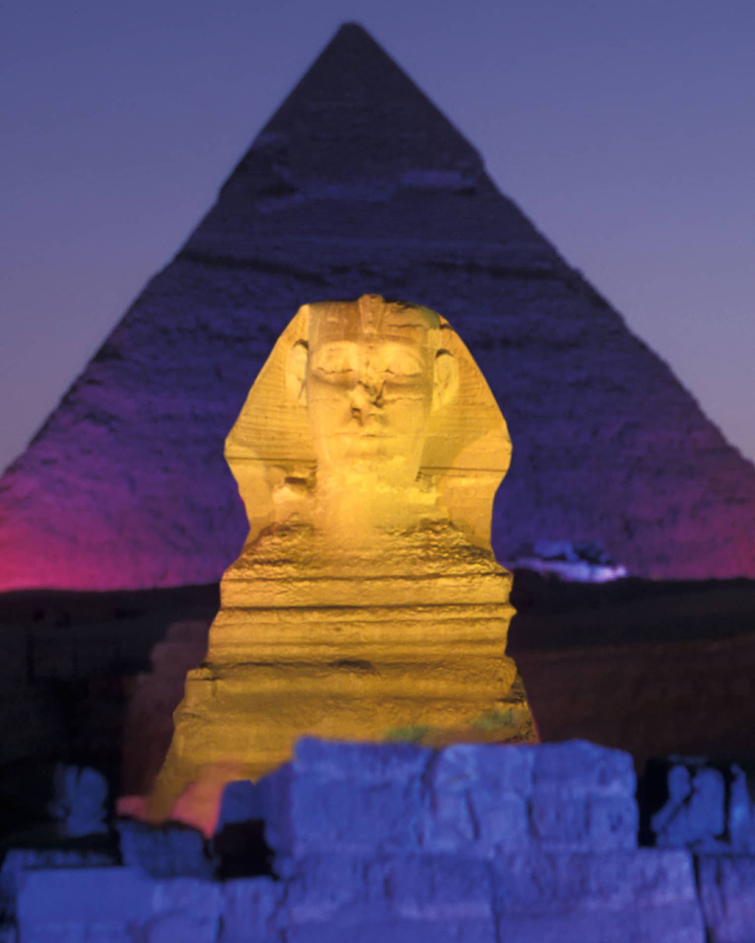 Night view of Pyramids of Giza and Great Sphinx illuminated