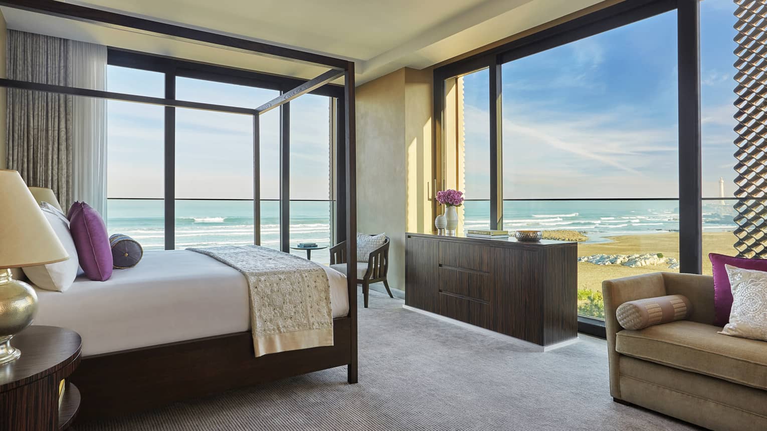 The modern Imperial Suite Ocean View Room bathed in bright sunlight