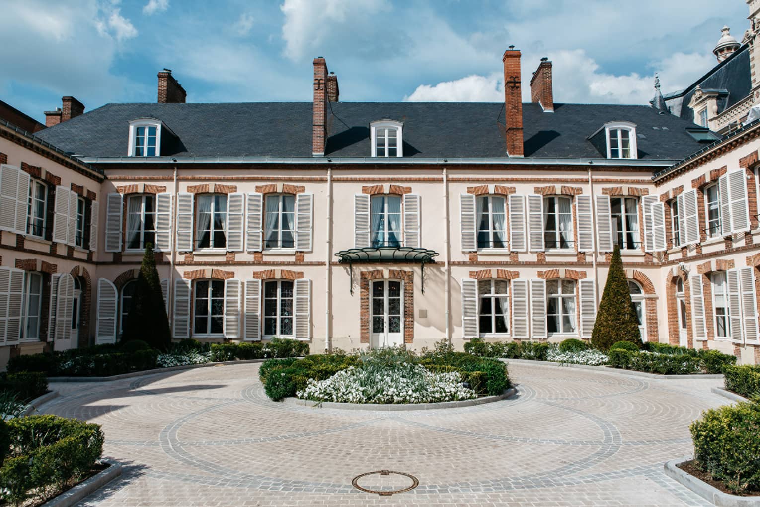 Rear courtyard view of the Maison Belle �poque 19th-century mansion