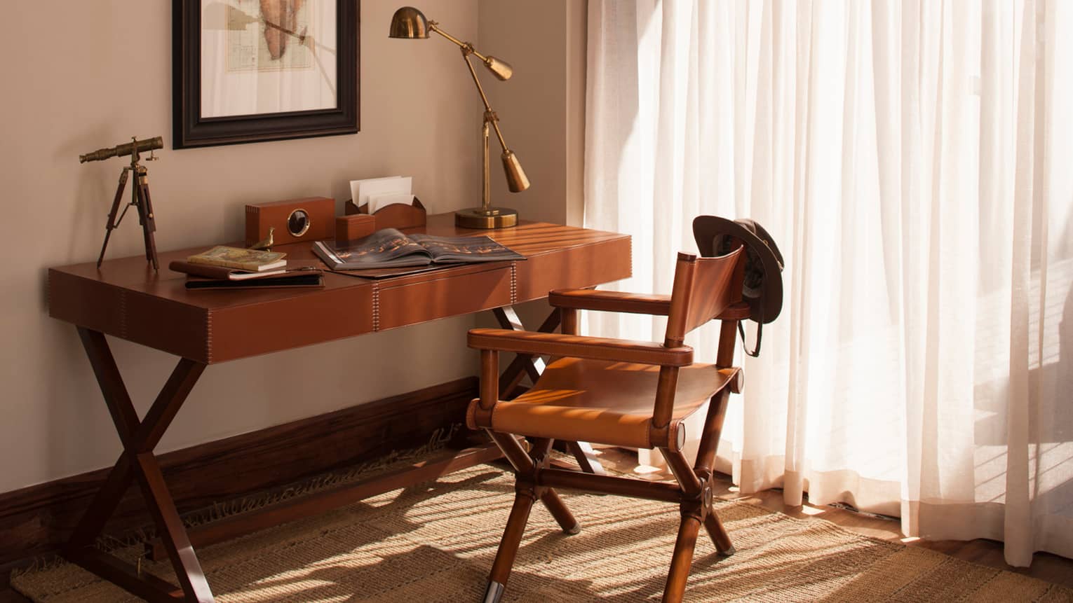 Presidential Villa wood desk with open magazine, brass lamp and telescope, leather chair 