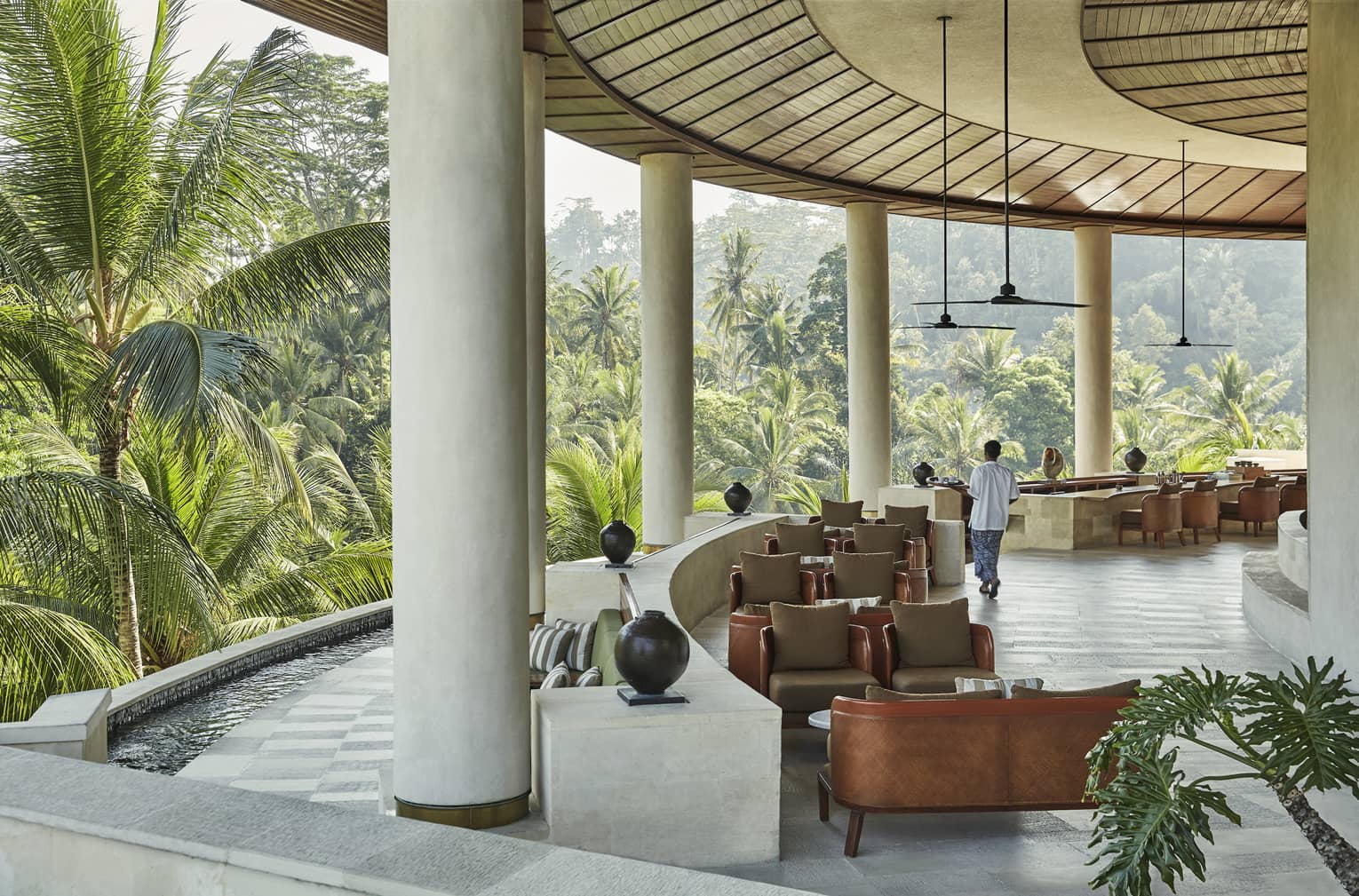 The lobby of the Four Seasons hotel in Bali, overlooking a vast forest